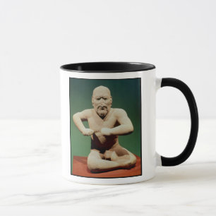 Figürchen eines Ringkämpfers Tasse