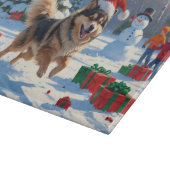 Finnischer Lapphund Running Snow mit Weihnachtshut Schneidebrett (Ecke)