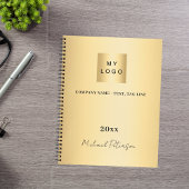 Firmenlogo, goldenes Namensschild Notizblock