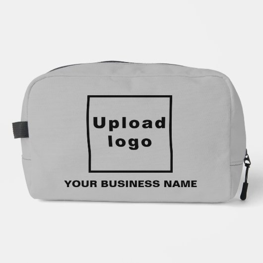 Firmenname und Logo auf dem grauen Dopp-Kit Waschbeutel (Vorderseite)