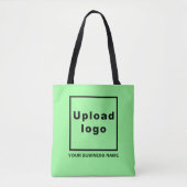Firmenname und Logo auf der hellgrünen Tasche (Vorderseite)