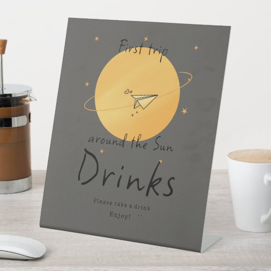 First Trip Around The Sun Paper Airplane Drinks Sockelschild (In Situ)