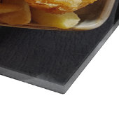 Fische und Chips für nahe Schneidebretter Schneidebrett (Ecke)