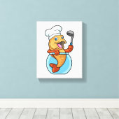 Fischen in Glas als Koch mit Soup-Löffel Leinwanddruck (Insitu (Holzboden))