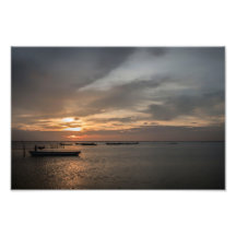 Fischer bei Sonnenuntergang am Strand