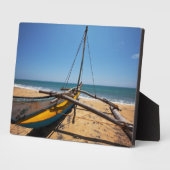 Fischerboot am Strand verankert Fotoplatte (Seite)