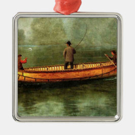 Fischerei von einem Kanu (Fischer in einem Holzboo Ornament Aus Metall