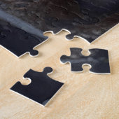 Fischotter schwimmt mit Wildblumenstrauß Puzzle (Seite)