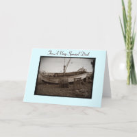fishing boat and lobster pots on beach seaside dad