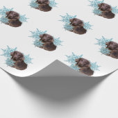 Flachbildschirm Retriever im Schneeflocken Geschenkpapier (Ecke)