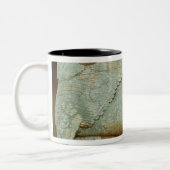 Flachrelief eines anthropomorphen Stiers Zweifarbige Tasse (Links)