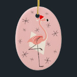 Flamingo Santa Pink Text Ornament Oval<br><div class="desc">Ein lebendiges,  eigenartiges Weihnachtsdesign mit Retro-Touch mit einem rosa Flamingo mit Weihnachtsmannmütze,  geometrischen,  cremefarbenen Formen und Sternen auf rosa (Farbveränderung) Hintergrund. Ein individuell anpassbares Design für Sie,  um mit Ihrem eigenen Text,  Bildern und Ideen zu personalisieren. Ein originales digitales Kunstbild von QuirkyChic.</div>