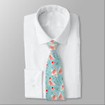 Flamingo Santas Blue Multi Krawatte<br><div class="desc">Ein lebendiges,  eigenartiges Weihnachtsdesign mit Retro-Touch mit rosa Flamingos mit Weihnachtsmannmützen,  cremefarbenen geometrischen Formen und blauen Sternen (Farbwechsel). Ein individuell anpassbares Design für Sie,  um mit Ihrem eigenen Text,  Bildern und Ideen zu personalisieren. Ein originales digitales Kunstbild von QuirkyChic.</div>