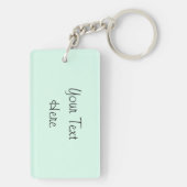 Flamingo Text hinter Schlüsselanhänger grün (Rückseite)