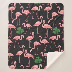 Flamingo-Vogel mit Monstera-Palm-Blätter Muster.  Sherpadecke