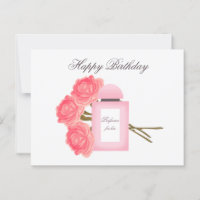 Flasche Parfüm und Bouquet von Rose