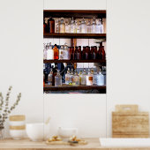 Flaschen mit Chemikalien auf Regalen Poster (Küche)