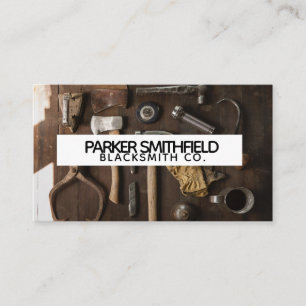 Flatlay rustikale SchmiedeAuto-Gebäude-Werkzeuge Visitenkarte