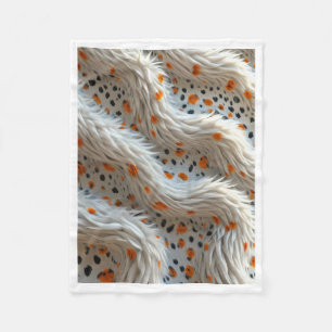 Flauschiges Cremefell mit orangefarbenen und schwa Fleecedecke