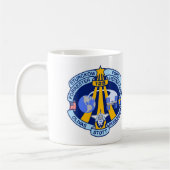 Flecken des Auftrag-STS-128 Kaffeetasse (Links)