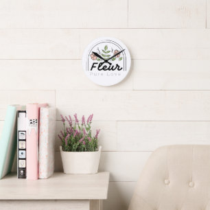 Fleur – Pure Love Florales Logo Runde Wanduhr