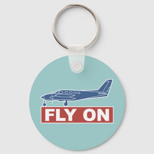 Fliegen im Flugzeug Schlüsselanhänger (Vorderseite)