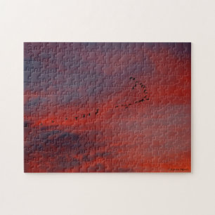 Fliegen in den Sonnenuntergang Puzzle