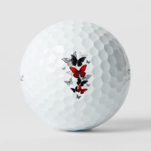 Fliegende schwarze und rote Morpho-Schmetterlinge Golfball