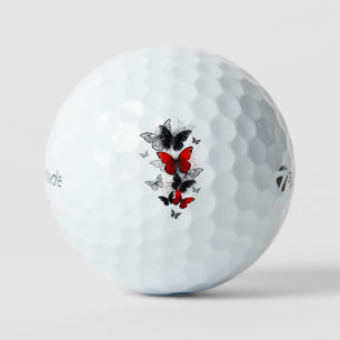 Fliegende schwarze und rote Morpho-Schmetterlinge Golfball