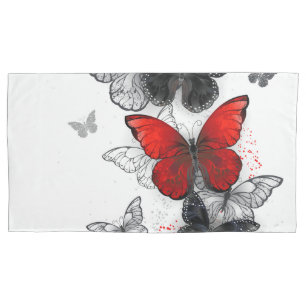 Fliegende schwarze und rote Morpho-Schmetterlinge Kissenbezug