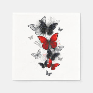 Fliegende schwarze und rote Morpho-Schmetterlinge Serviette