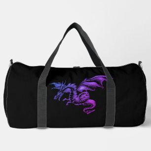 Fliegender lila Drache gegen Schwarz Duffle Bag