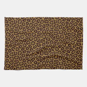 Fliesenhintergrund mit einem Leopardpelz Handtuch