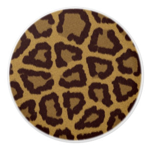 Fliesenhintergrund mit einem Leopardpelz Keramikknauf