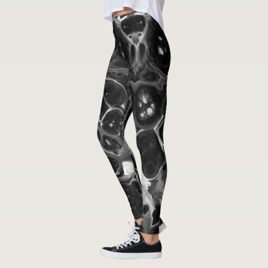 Flippiges Schwarzes u. Weiß Leggings (Links)