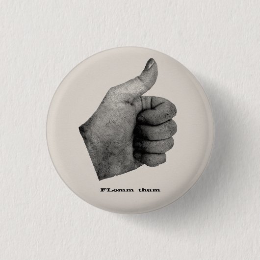 FLomm Daumen Button (Vorderseite)