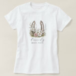 Floral Cowgirl Bride Posse Floral Horseshoe T-Shirt<br><div class="desc">Round up your bride posse in style with this watercolor cowgirl boots tee—perfect for western-themed bachelorette weekends, rustic ranch getaways, or country-chic celebrations. Featuring soft floral horseshoe, and a custom script name, it’s made for brides and their friends who bring the boots and the beauty. Coordinate the crew and make...</div>