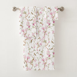 Floral-patterned towels hang neatly badhandtuch set