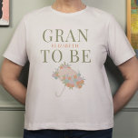 Floral Regenschirm GRAN TO BE TEXT BACK Baby Dusch T-Shirt<br><div class="desc">***Dieses Design ist Teil einer Babyduschkollektion*** Genießen Sie Ihre Baby Duschgäste von Anfang an mit meiner Floral Umbrella Neutral Unisex Baby Shower Collection! Meine individuell anpassbaren Vorlagen bringen eine Touch von Laune und Eleganz in jedes Baby Duschbad Party. Das geschlechtsneutrale Design, hervorgehoben durch wunderschöne, mutierte Pastellfarben, macht es zu einer...</div>