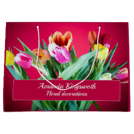Florale Business Packung farbige Tulpen auf rot Große Geschenktüte