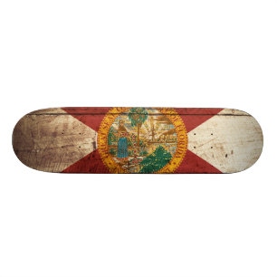 Florida-Staats-Flagge auf altem hölzernem Korn Skateboard