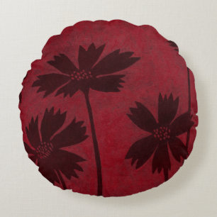 Flowerhead Silhouetten auf hochrotem Hintergrund Rundes Kissen