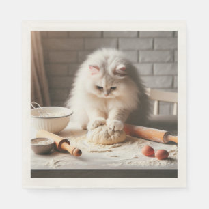 Fluffige Katze backt eine Pizzabasis Serviette