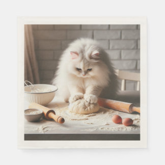 Fluffige Katze backt eine Pizzabasis Serviette