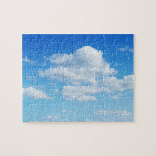 Fluffige Wolken und blauer Himmel Puzzle