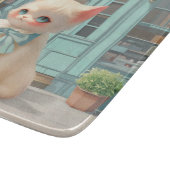Fluffy Kitten mit Blue Bow im Konditorladen Schneidebrett (Ecke)
