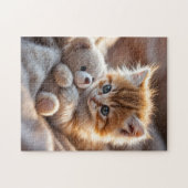 Fluffy red kitten playing with a tiny teddy bear, puzzle (Horizontal)