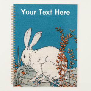 Fluffy White Rabbit Sitzen in Hübschen Blume Blau Planer