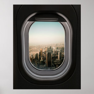 FLUGFENSTER MIT BLICK AUF DIE STADT WÄHREND DES TA POSTER