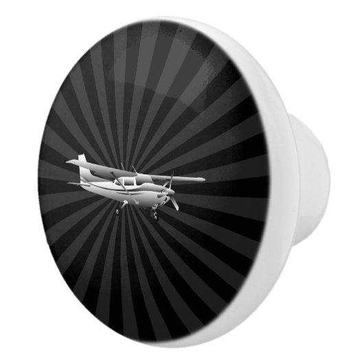 Flugzeug-Cessna-Silhouette, die schwarzen Keramikknauf (Rechts)